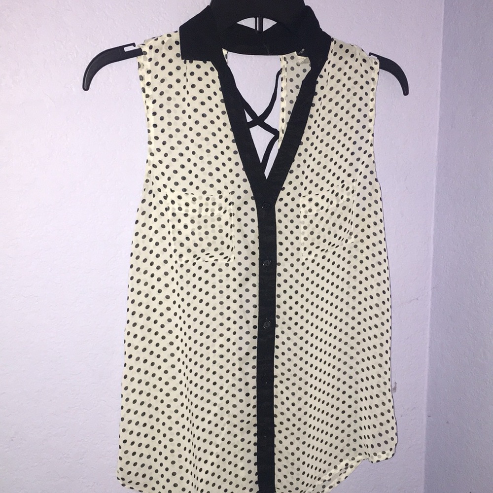 Sleeveless polka dot blouse